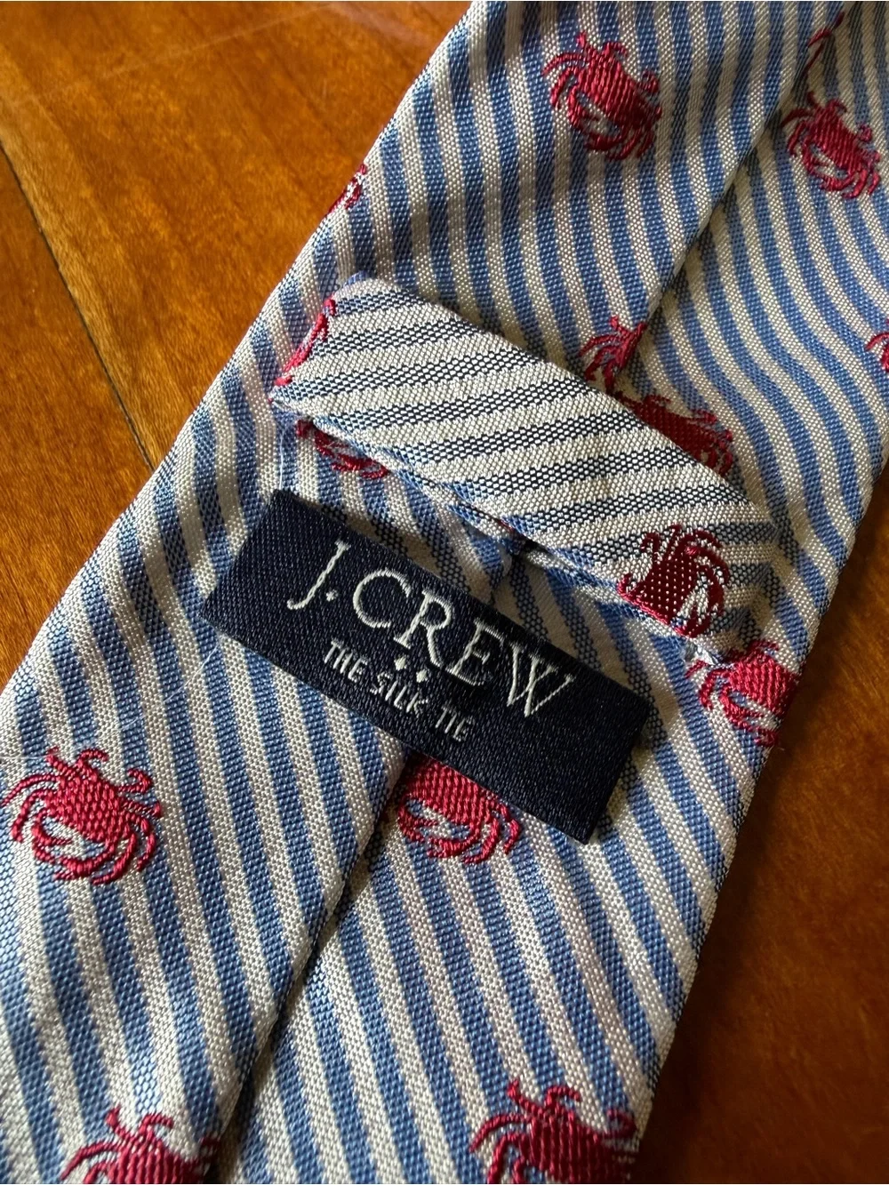 J. Crew 100% silk blue and white thin tie with crabs design all over great style